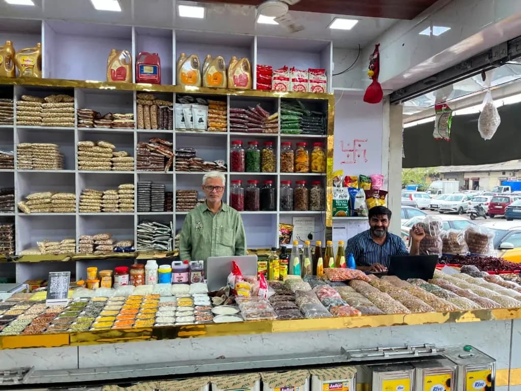 The Jai Mahakal Traders team — smiling staff ready to serve you